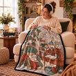 Woman coloring the Reading Nook design coloring blanket while relaxing with headphones on